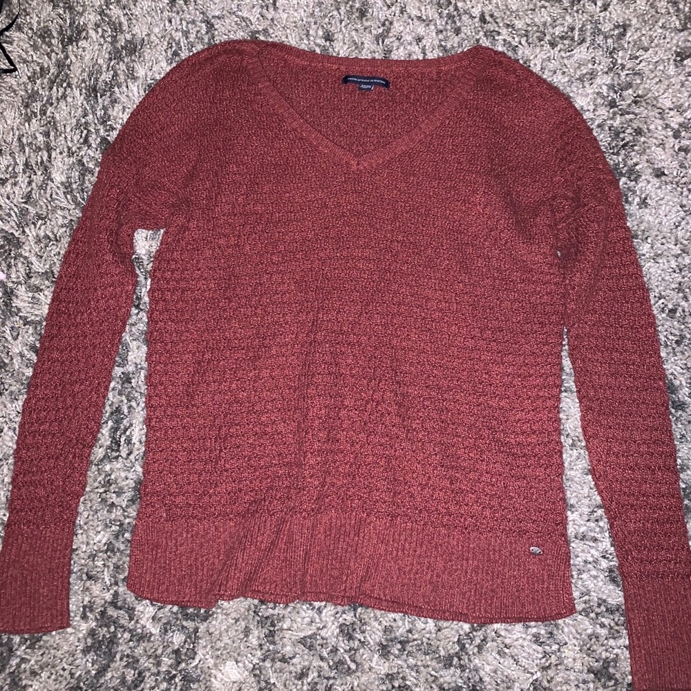 Red v-neck sweater